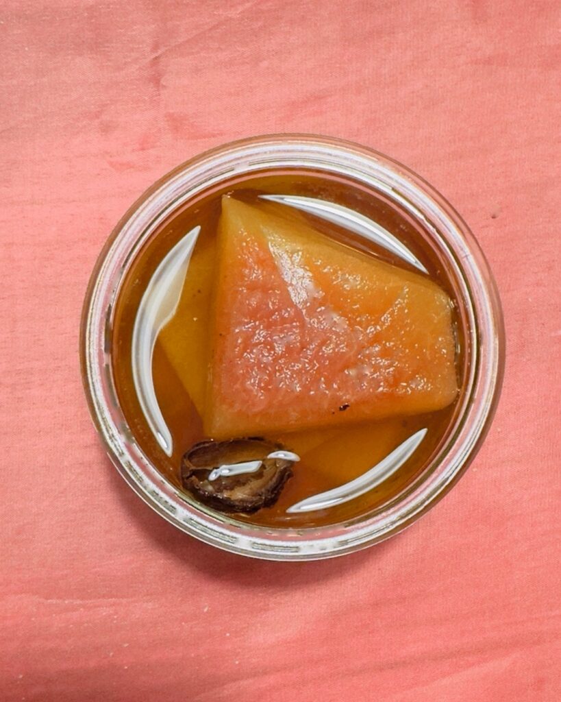 Watermelon rind preserve in sour kombucha with smoked black cardamom